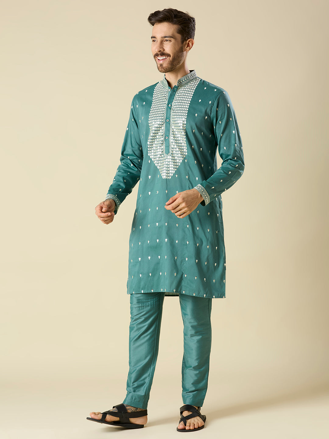 BOTTLE GREEN KURTA PYJAMA SET WITH INTRICATE EMBROIDERY AROUND NECKLINE