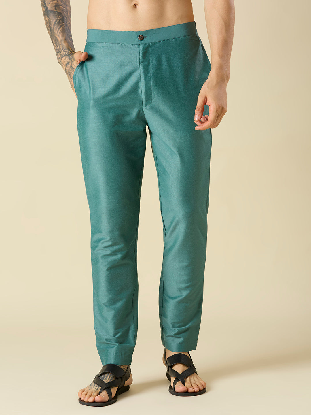 BOTTLE GREEN KURTA PYJAMA SET WITH INTRICATE EMBROIDERY AROUND NECKLINE