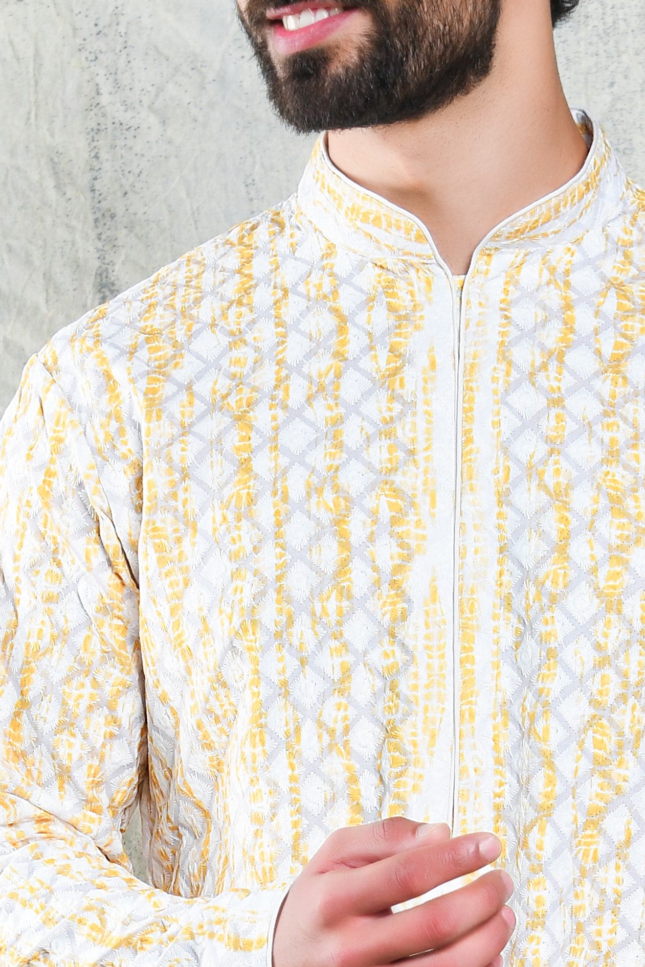 EMBROIDERED YELLOW SHIBORI DESIGN KURTA PYJAMA SET WITH CONTRAST NECK PIPING DETAIL