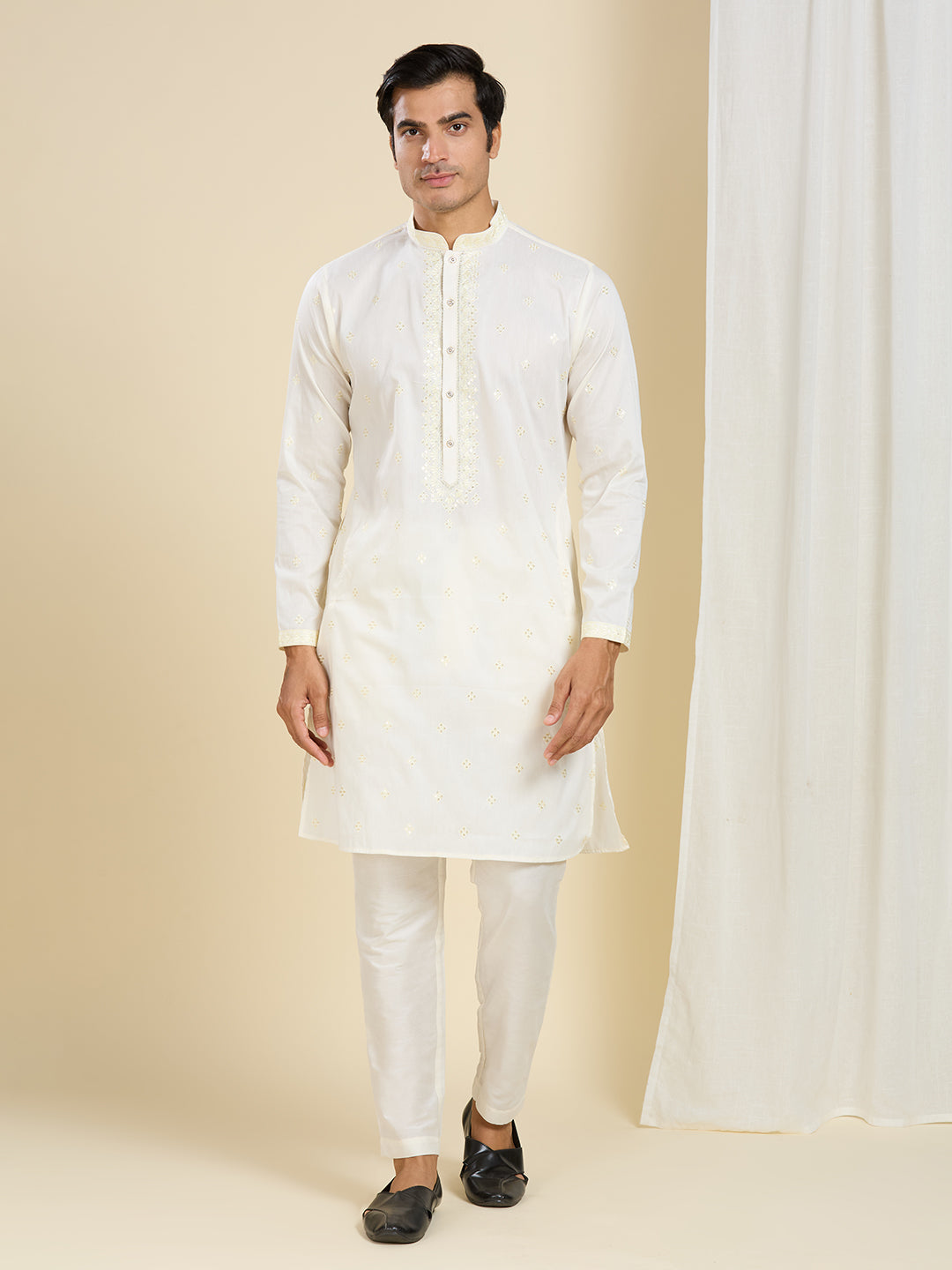 IVORY CREAM KURTA PYJAMA SET WITH INTRICATE EMBROIDERY AROUND NECKLINE