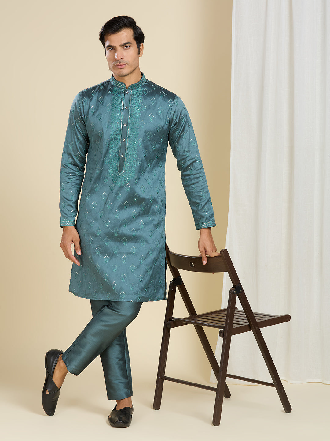 PEACOCK GREEN KURTA PYJAMA SET WITH INTRICATE NECK EMBROIDERY WORK