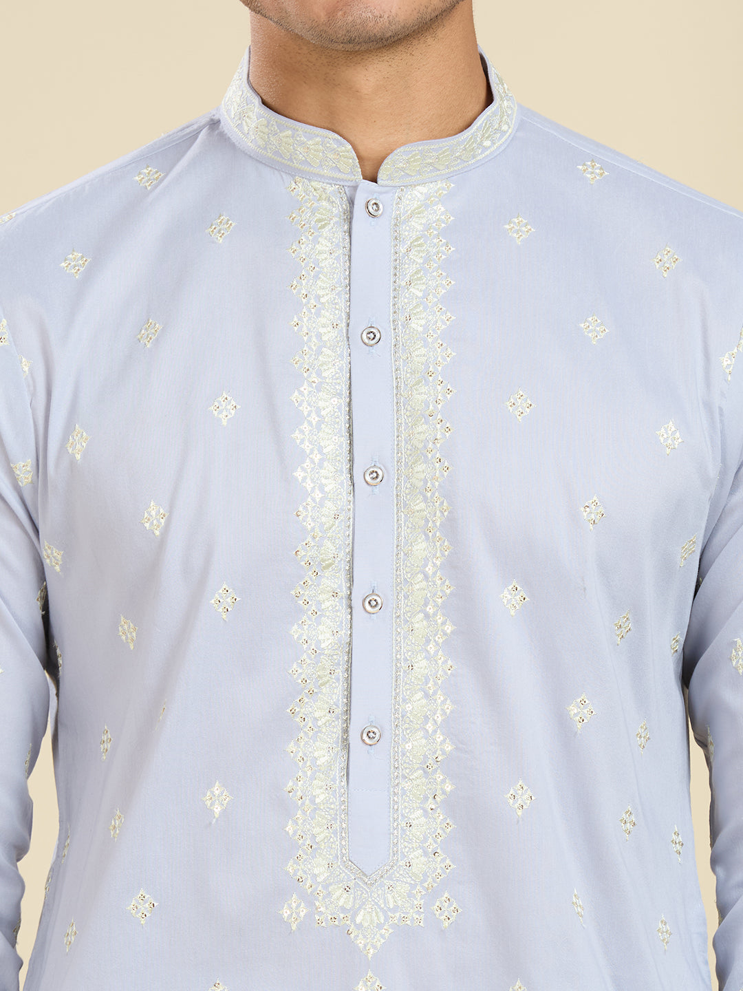 LIGHT BLUE KURTA PYJAMA SET WITH INTRICATE EMBROIDERY AROUND NECKLINE