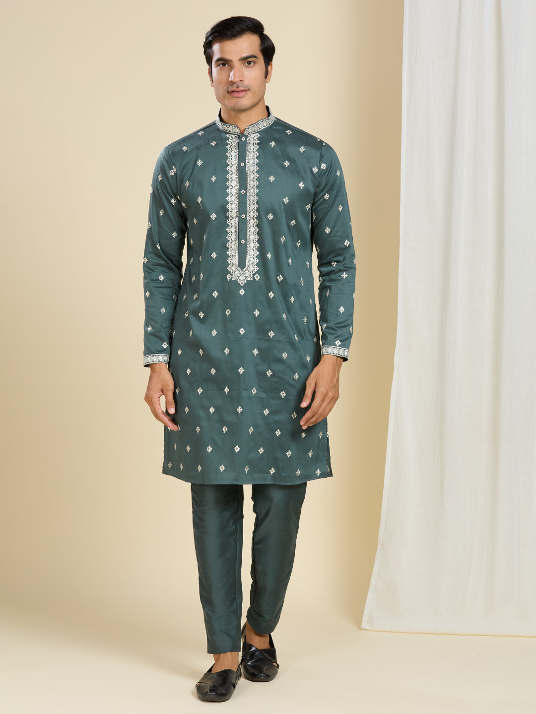 BOTTLE GREEN KURTA PYJAMA SET WITH INTRICATE EMBROIDERY AROUND NECKLINE