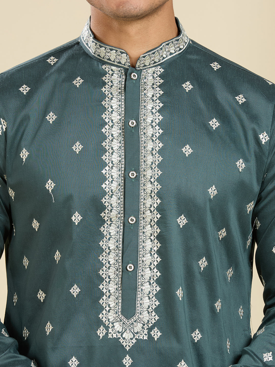BOTTLE GREEN KURTA PYJAMA SET WITH INTRICATE EMBROIDERY AROUND NECKLINE