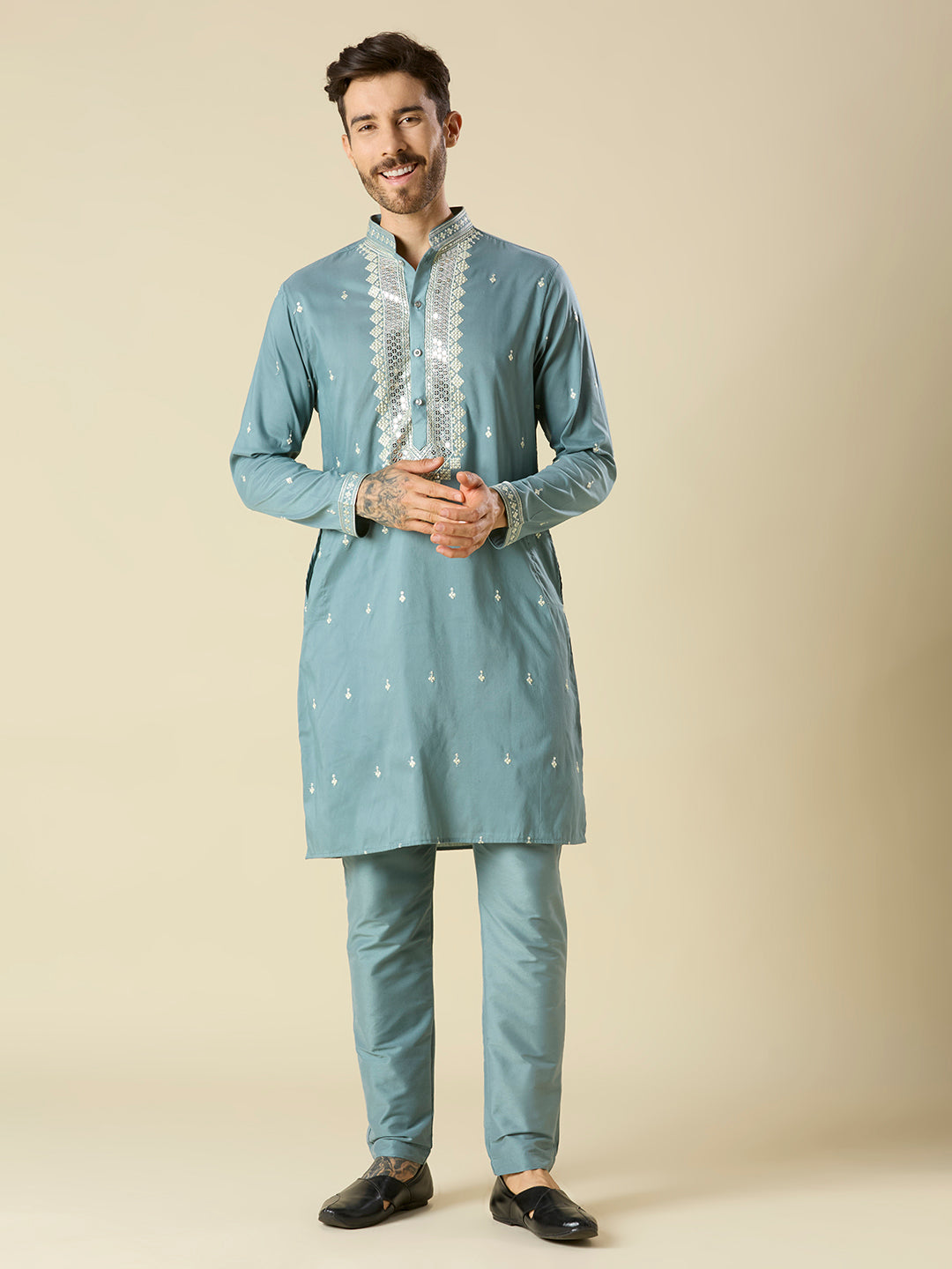 BLUISH GREEN KURTA PYJAMA SET WITH INTRICATE EMBROIDERY AROUND NECKLINE