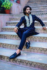 TUXEDO BLACK KURTA SET WITH ELABORATE EMBROIDERY AROUND PLACKET