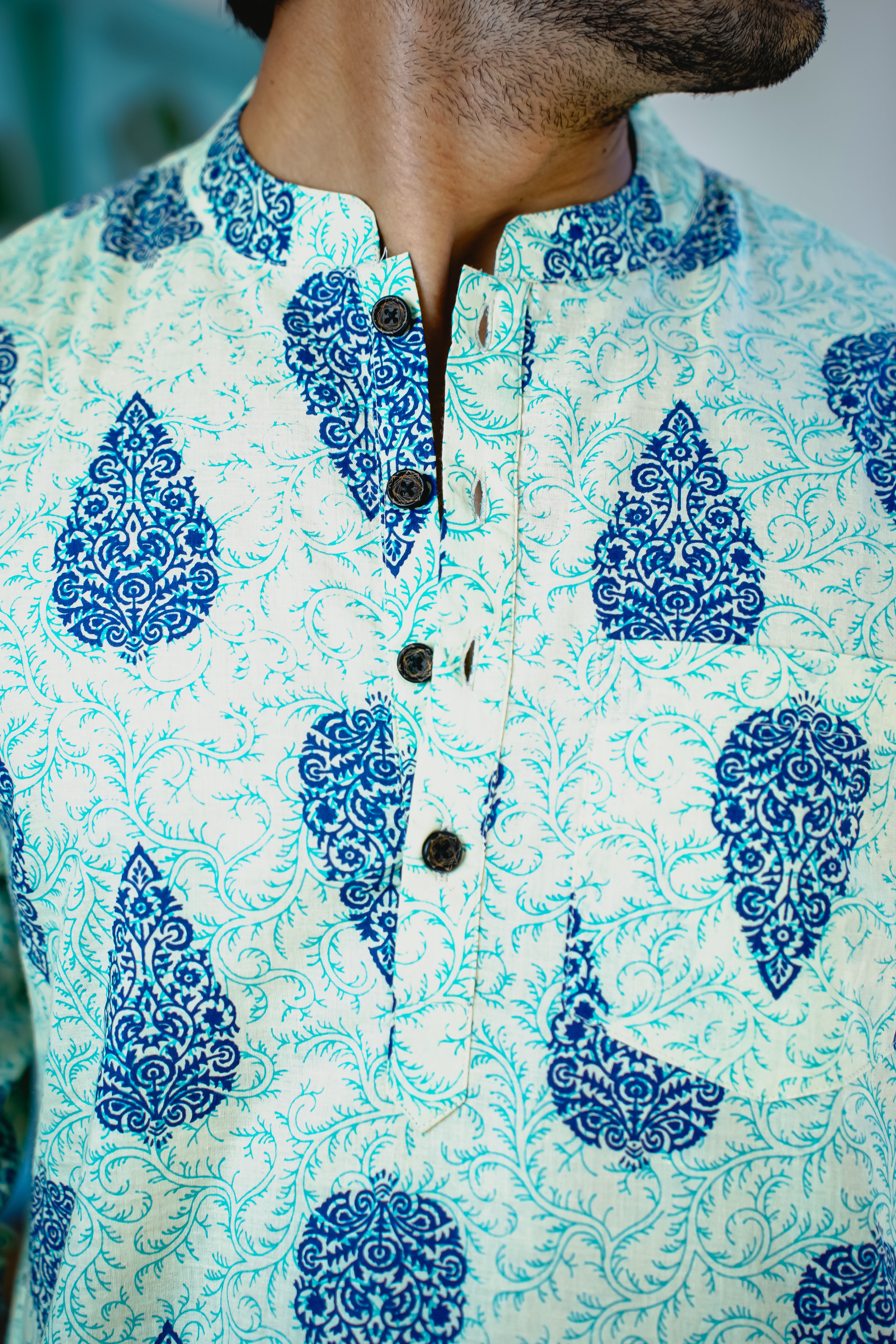 IVORY & BLUE LEAF MOTIFS PRINTED SHORT KURTA WITH CUFF