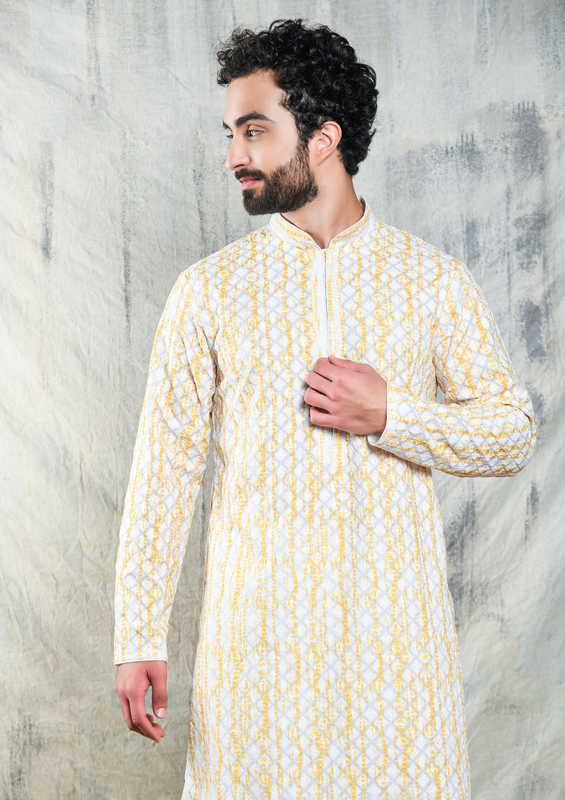 EMBROIDERED YELLOW SHIBORI DESIGN KURTA PYJAMA SET WITH CONTRAST NECK PIPING DETAIL