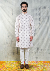 LIGHT CREAM MOTIF PRINTED POLY SILK KURTA PYJAMA SET WITH EMBROIDERY