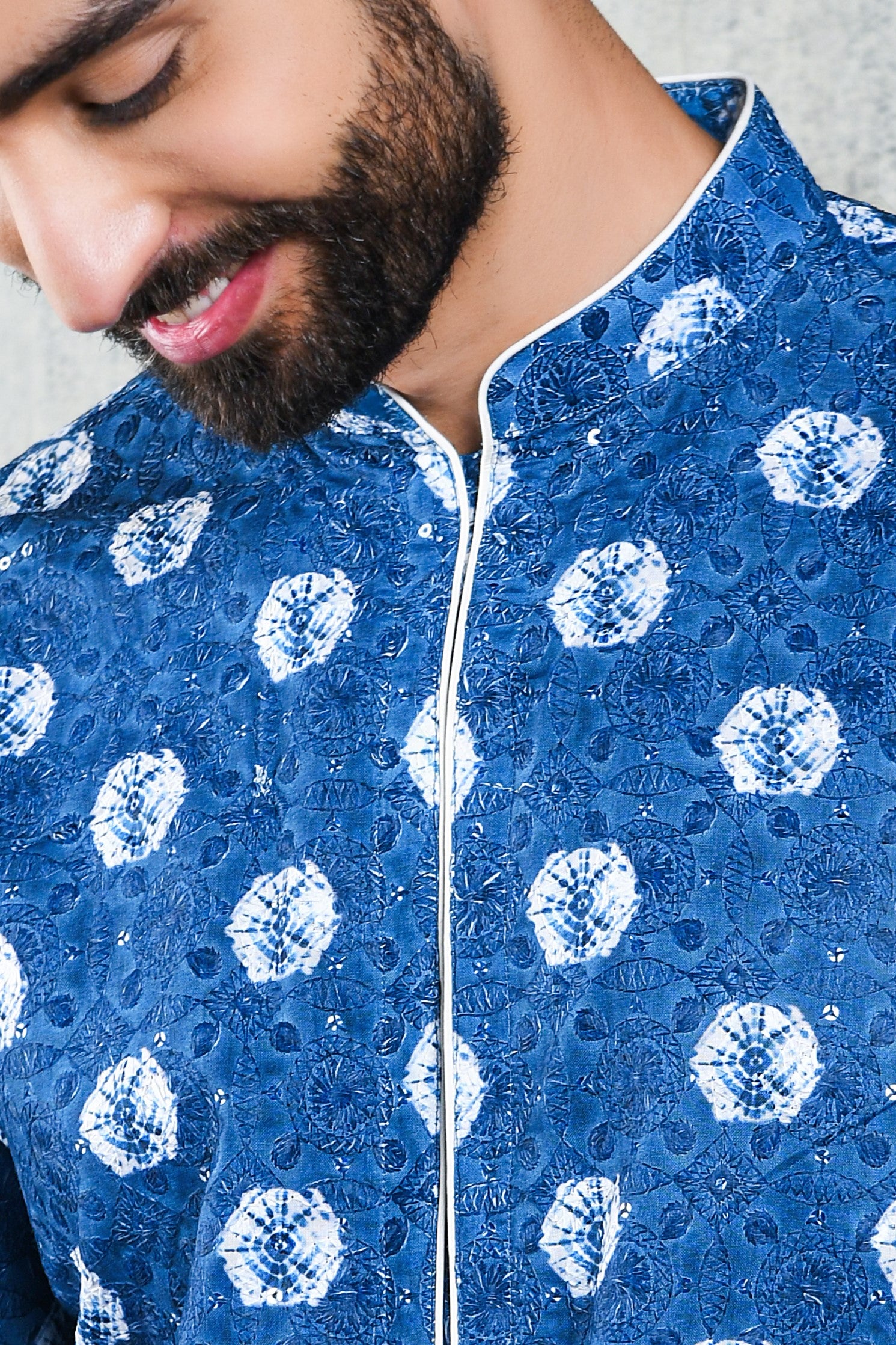 EMBROIDERED REFLEX BLUE BANDHANI KURTA PYJAMA SET WITH SEQUINS & CONTRAST PIPING DETAIL