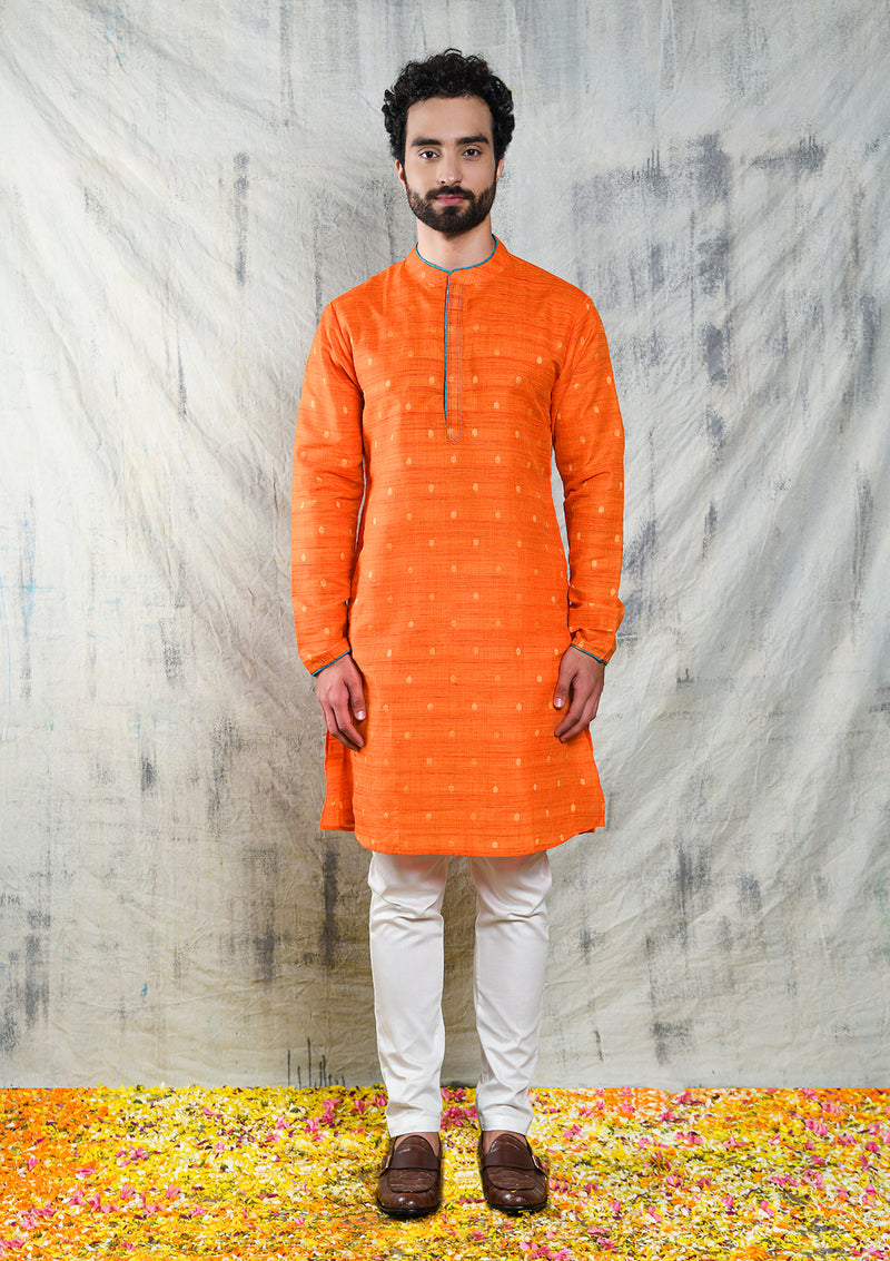 ORANGE RAW SILK KURTA PYJAMA SET WITH CONTRAST PIPING DETAIL