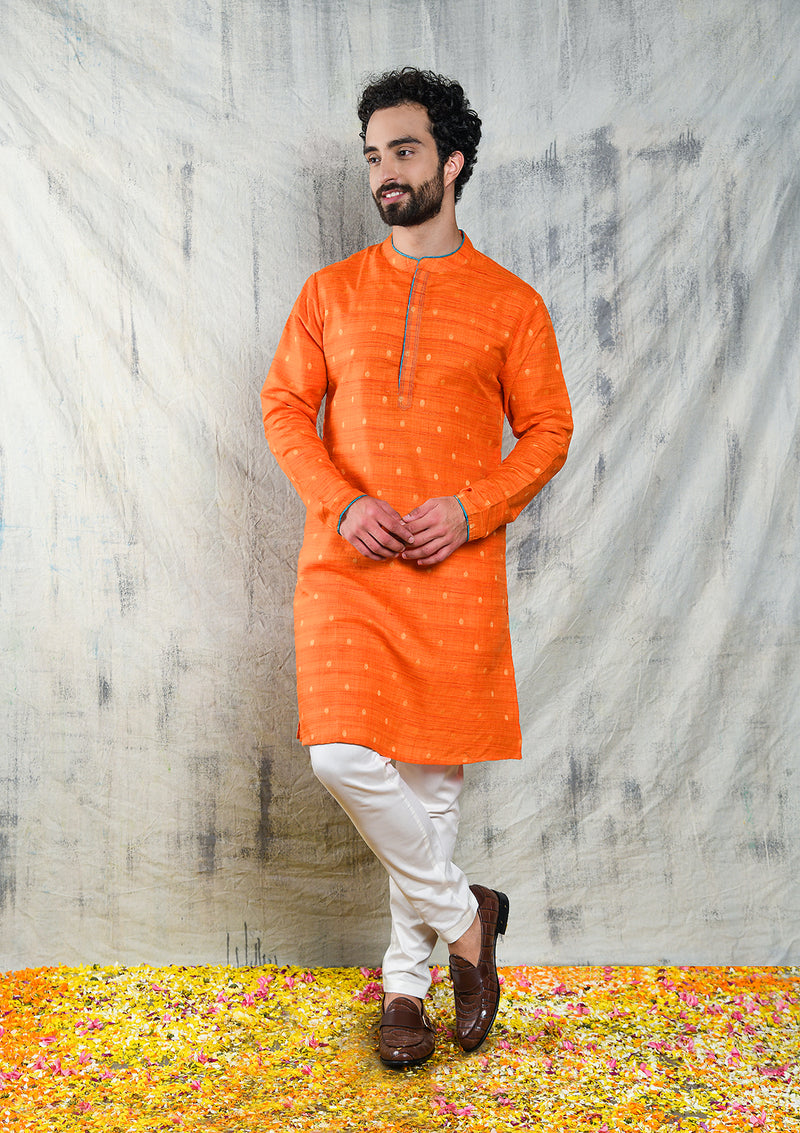 ORANGE RAW SILK KURTA PYJAMA SET WITH CONTRAST PIPING DETAIL