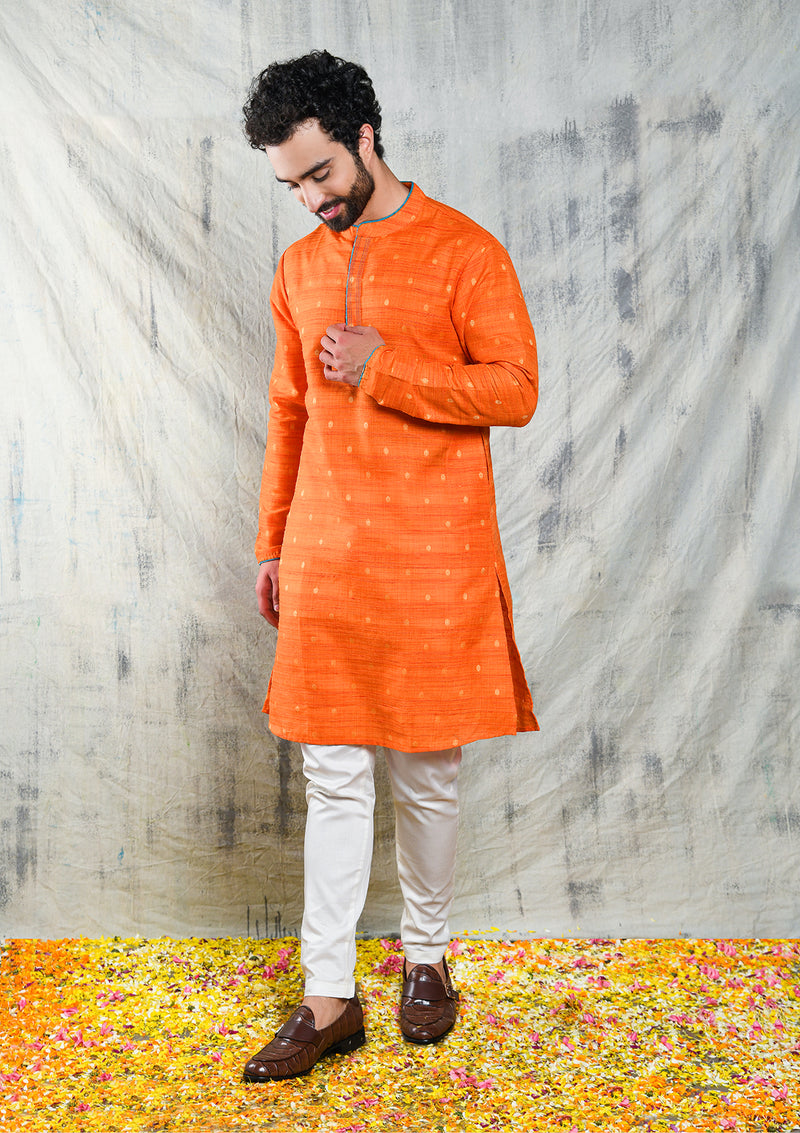 ORANGE RAW SILK KURTA PYJAMA SET WITH CONTRAST PIPING DETAIL