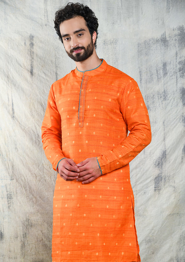 ORANGE RAW SILK KURTA PYJAMA SET WITH CONTRAST PIPING DETAIL