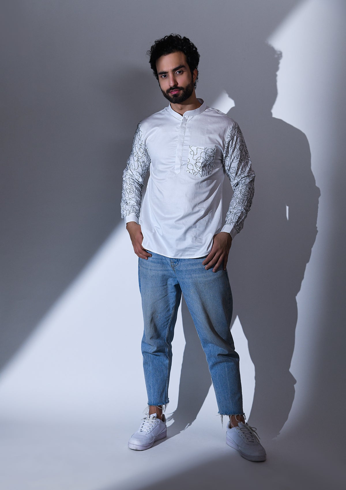 WHITE SATIN ABSTRACT POCKET AND SLEEVE EMBRIODERED SHORT KURTA