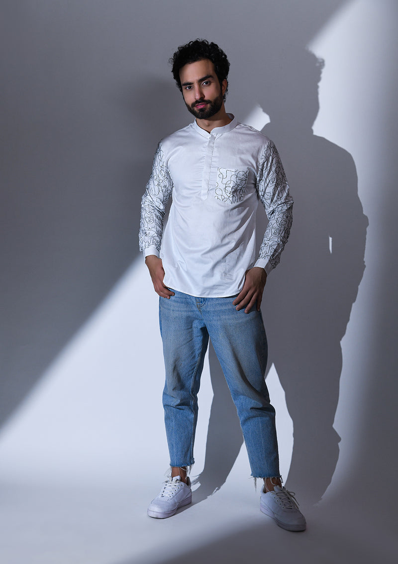 WHITE SATIN ABSTRACT POCKET AND SLEEVE EMBRIODERED SHORT KURTA