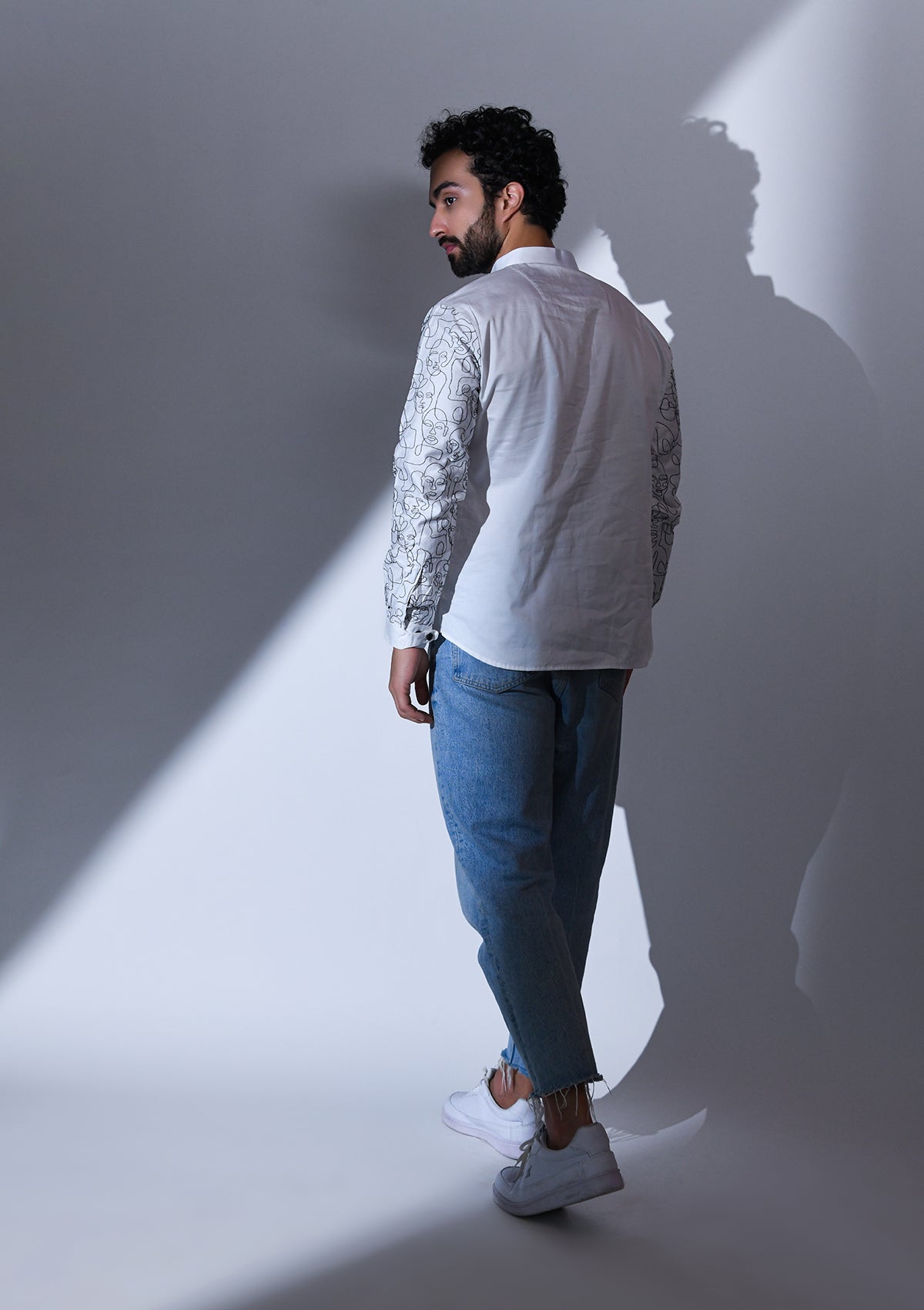 WHITE SATIN ABSTRACT POCKET AND SLEEVE EMBRIODERED SHORT KURTA