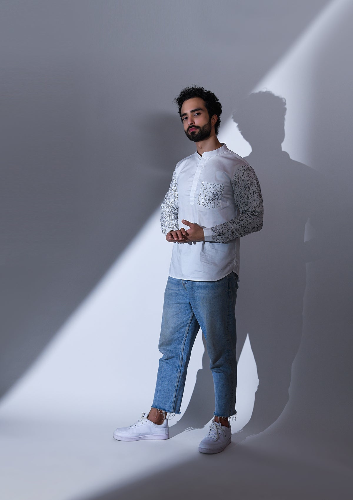 WHITE SATIN ABSTRACT POCKET AND SLEEVE EMBRIODERED SHORT KURTA